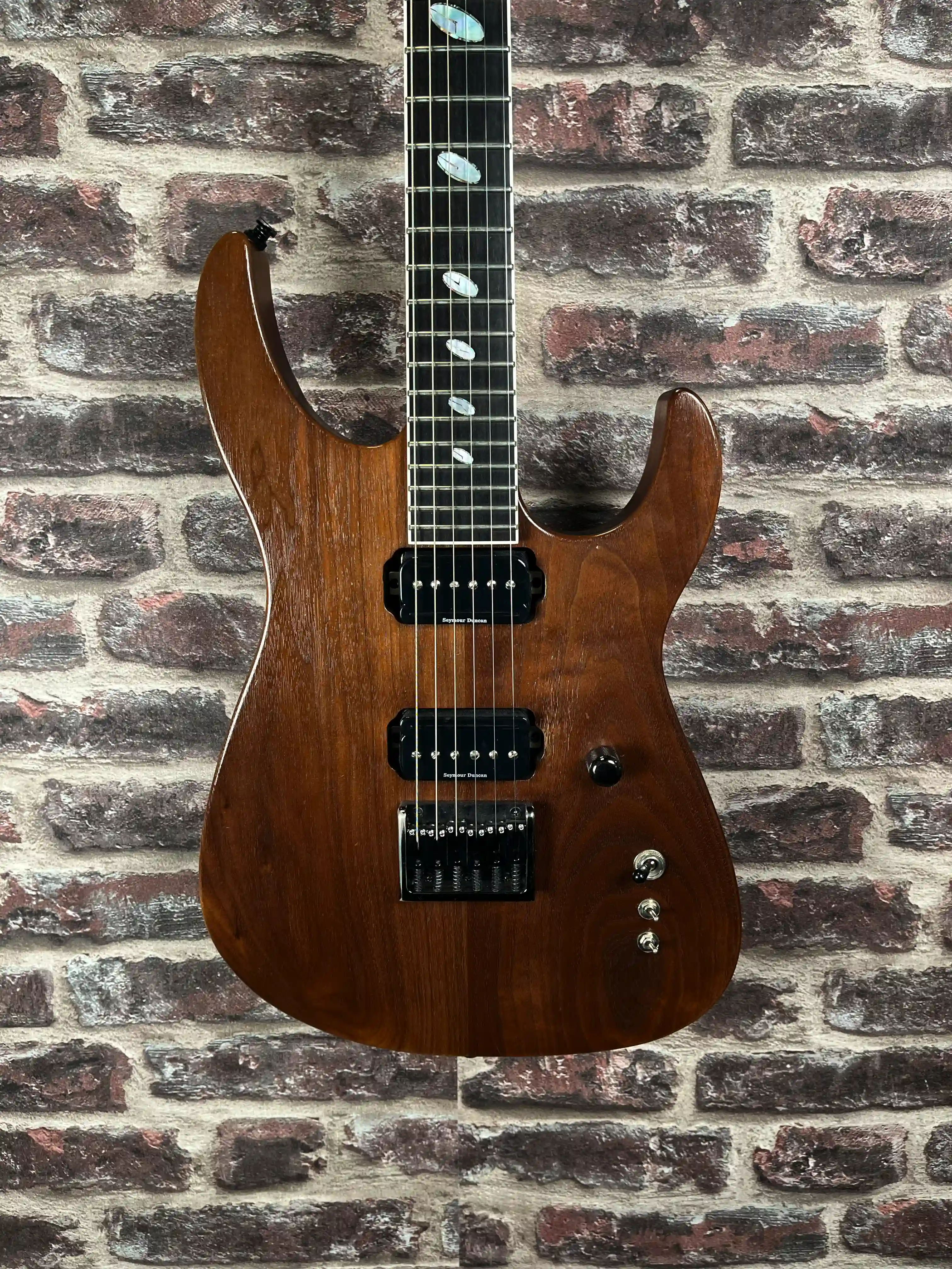 Caparison Dellinger–WB‑FX 6 cordes Walnut top OCCASION