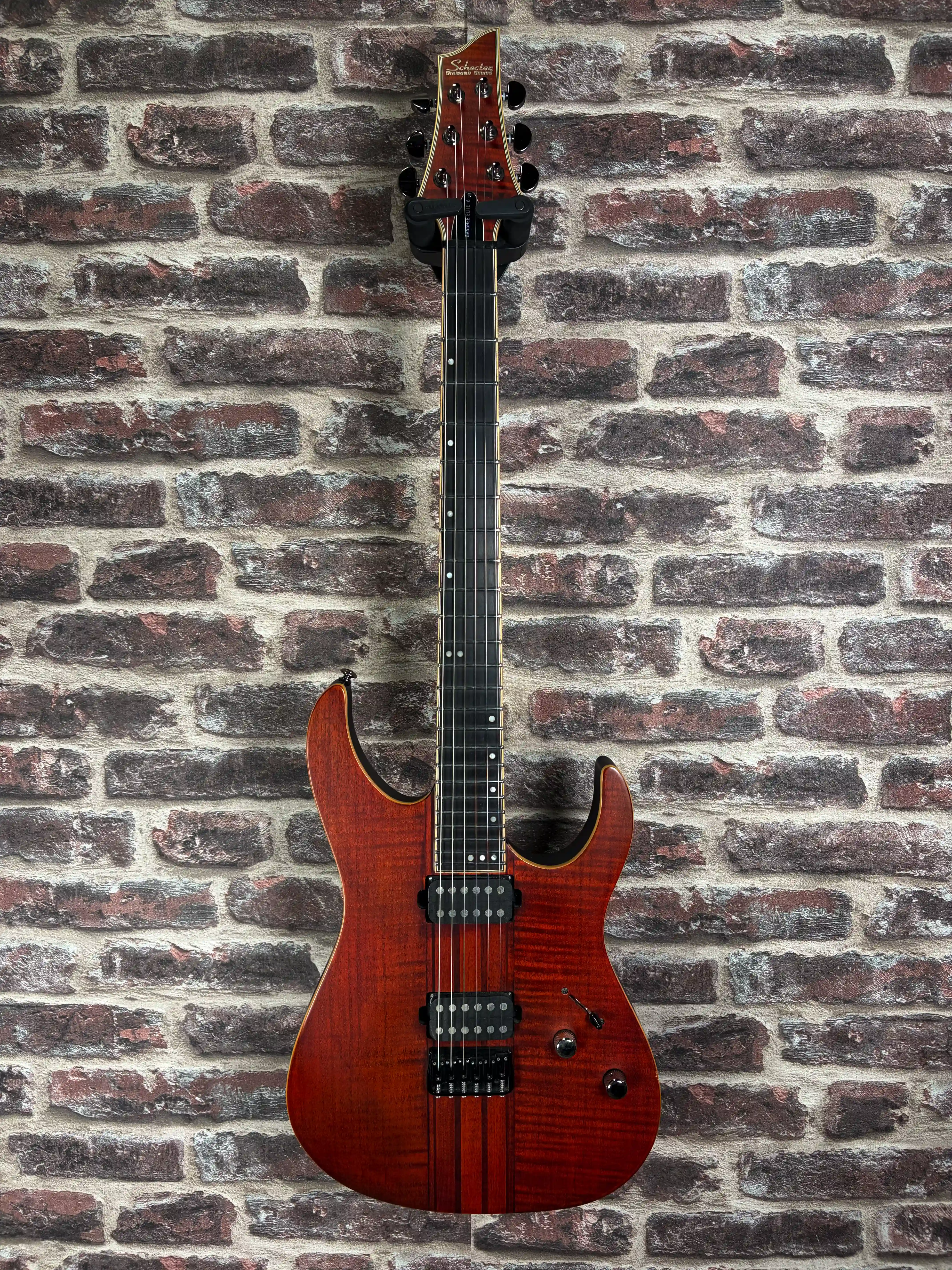 Schecter Banshee Elite‑6 Cat's eye Pearl OCCASION