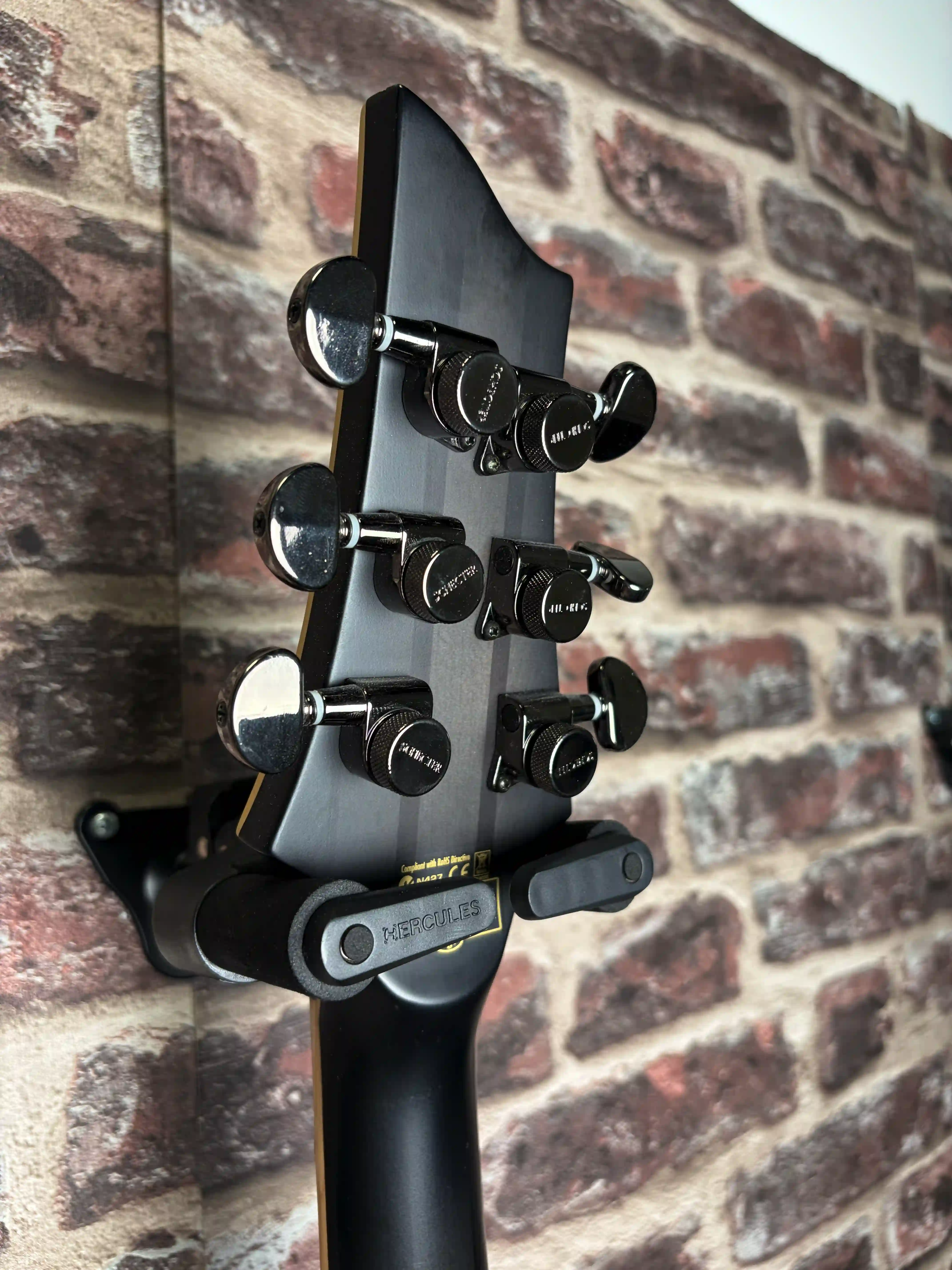 Schecter Banshee Elite‑6 Cat's eye Pearl OCCASION